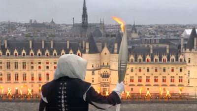 Paris Olympic torches, other memorabilia auctioned off